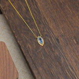 Elegant Oval Blue Topaz Birthstone Necklace