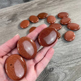 Gemstone Palm Stones 45mm – Bulk Crystal Supplies: Goldstone
