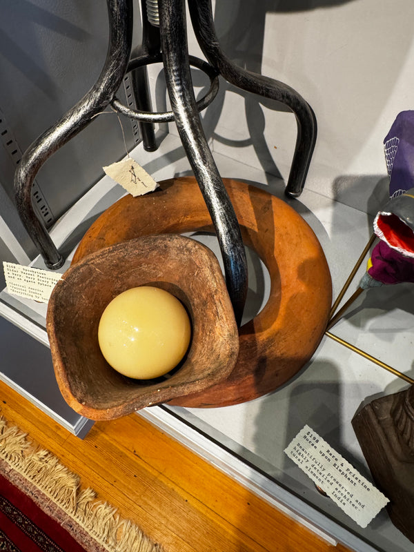 Vessel with Spooky Face and Agate Sphere