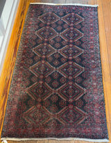 The Nomad's Last Mile • Afghan-Baluch Tribal Rug • 31" x 59"