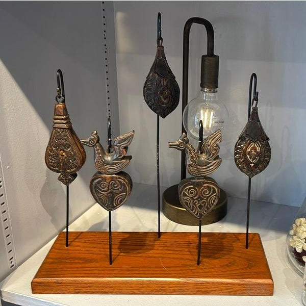 Collection of Wooden Pulleys on Stand